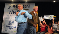 Libertarian presidential candidate and former New MexicoGov. Gary Johnson. left, takes the stage at the Albuquerque Convention Center after being introduced by his running mate Bill Weld during a campaign rally Saturday Aug. 20, 2016, in Alburquerque, N.M. (Jim Thompson/The Albuquerque Journal via AP)