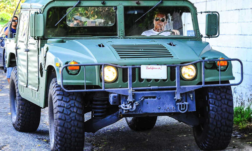 Schwarzenegger being forced to drive a gas guzzling Hummer by “big oil”. Does this make him an accessory to first degree murder?