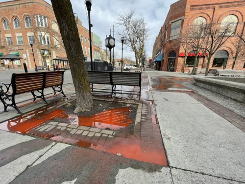 Red chalk run-off in Friendship Square.